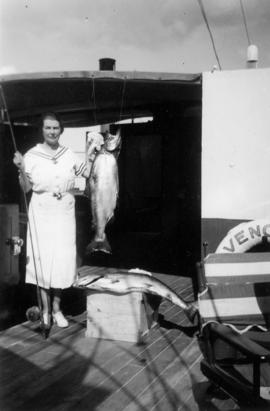 Aldyen Hamber showing off her catch aboard the Vencedor