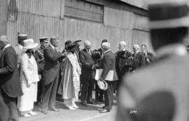 [Premier John Oliver shaking hands with President Warren Harding on C.P.R. dock.]