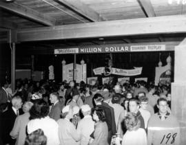 Crowd around Millers Jewelers display in Manufacturers building