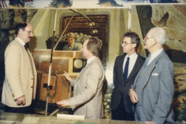 Mike Harcourt, Ferdinand Petrov, unidentified man and Fraser Wilson in front of mural