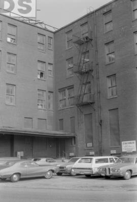 Taylor Street [Building and parked cars]