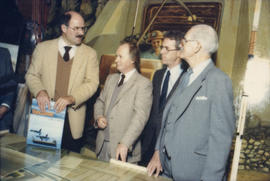 Mike Harcourt, Ferdinand Petrov, unidentified man and Fraser Wilson in front of mural