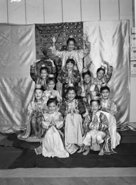 Actors playing the princes and princesses of Siam in "The King and I"