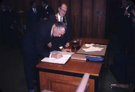 City Hall; Prince Bertil [of the Netherlands] signing Visitors Book