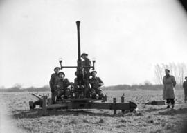 [Crew firing anti-aircraft gun on Lulu Island]