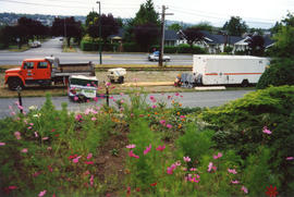 All summer of '93 [construction vehicles and trailers in front of 3690 East Boulevard]