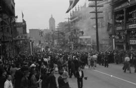 [Crowds on Pender Street during VJ Day celebrations]