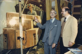 Fraser Wilson and Mike Harcourt looking at mural
