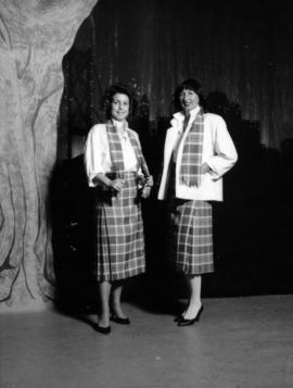 Karen Neveu and Kerry Rasmus model Centennial tartan