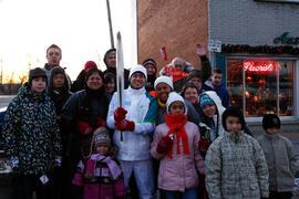 Day 39 Torchbearer 10 Vivano Nget poses with friends before his run in Shawinigan, Quebec