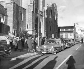 [Mourners watch the funeral procession for Alderman Birt Showler outside St. Andrew's Wesley Unit...