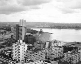 Bird's eye view of West End buildings, English Bay Beach and west shore of English Bay