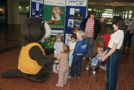 Tillicum interacting with children at Lougheed Mall