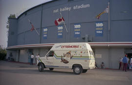 Chevron Ottermobile parked in front of Nat Bailey Stadium