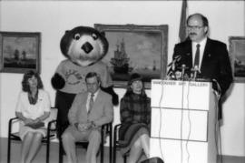 Mike Harcourt making announcement from podium at Vancouver Art Gallery