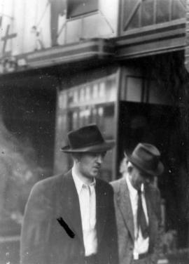 [Unidentified men]