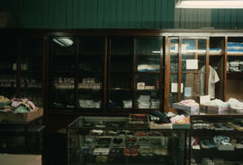 Textile wares displayed in cabinets at Wing Hing Dry Goods