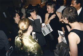 Barbara Crook surrounded by guests