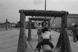 People on playground at Mid-Summer Festival at Strathcona Community Centre