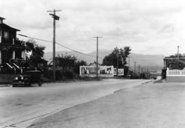 [A lighted Ruddy-Duker Ltd. billboard advertising Canadian Automatic Stokers Ltd.on Burrard Stree...