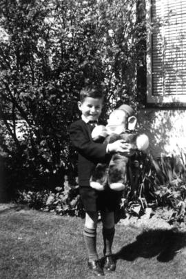 John Banfield holding stuffed animal