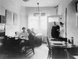 Interior of office at Vancouver General Hospital showing staff