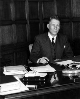 J.L. Ilsley at his desk