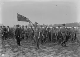 Military officers inspecting scouts