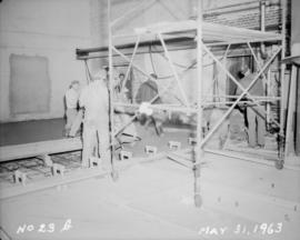 Liquid sugar station construction; pouring and troweling concrete