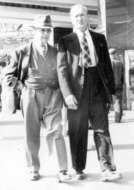 [Mr. Elliot and Reuben Hamilton at the corner of Cambie Street and Hastings Street]