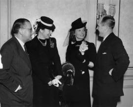 Mayor Arthur B. Langlie and Mrs. Langlie greeting Ms. Anna Neagle and Director Herbert Wilcox upo...