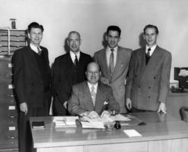 [Group portrait of five unidentified men]