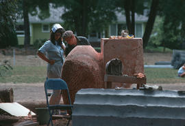 David Marshall and assistant at work