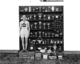 Mr. Chandler with [athletic] trophies