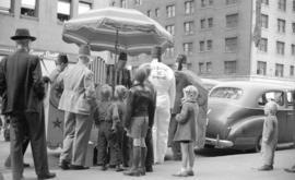 [Children gathered around float from the Shriner El-Kahf Temple of Spokane, Washington during a S...