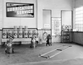 Roy Howard garage greasing room [at 849 Hornby Street]