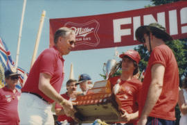 Award presentation at finish line