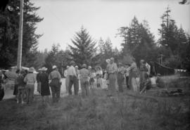 Group gathering together in a field