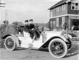 [Chief Turner and Captain Munro of Point Grey Fire Department aboard Fire Chief's automobile]