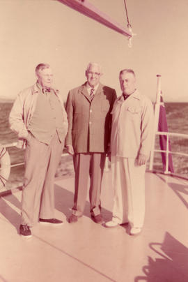 Eric W. Hamber and two friends on boat