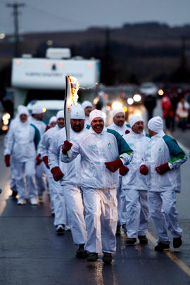 Day 30 Torchbearer 82 Gerald Desjardins leads his Torchbearer Group in Grand-Sault/Grand Falls, N...