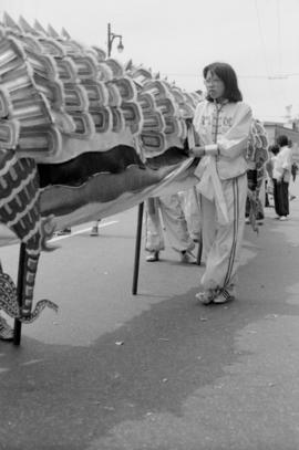 Kathy Wong, dragon dance volunteer, waiting for the Habitat Chinatown parade to begin