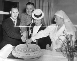 [Miss Margaret McNeil and others cut a diamond jubilee cake for the patients of Shaughnessy Hospi...