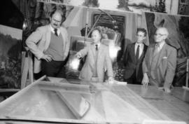 Mike Harcourt, Ferdinand Petrov, unidentified man and Fraser Wilson in front of mural