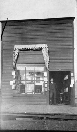 [C.S. Bailey in front of his studio at 227 Hastings Street]