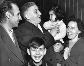 [Tom Goode, M.P. greets Hungarian refugee Helga in the Immigration Building at the airport]