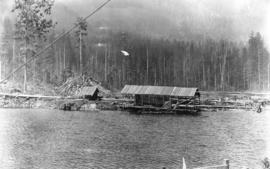 Coquitlam Dam "clearing" done by donkey in swamp below saw mill