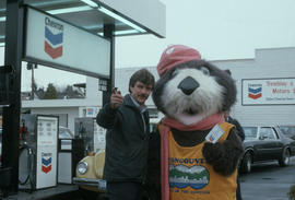 Sam Tremblay and Tillicum at Tremblay and Sons Chevron Station on 4th Avenue and Macdonald Street