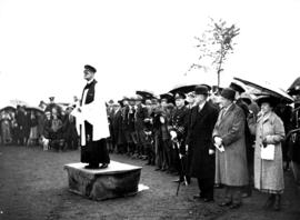 [Reverend J.W. Leighton dedicating the foremast of the H.M.C.S. "Vancouver" at Kitsilan...