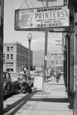 [View south down the east side of the 100 block of Abbott Street]